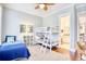 Charming bedroom featuring a bunk bed, twin bed, and a view to an ensuite bath at 843 Howard Ave., Myrtle Beach, SC 29577
