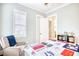 Bedroom featuring an armchair, soft rug, and a window providing ample natural light at 843 Howard Ave., Myrtle Beach, SC 29577