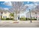 Charming two-story home with a balcony and well-manicured landscaping, creating a welcoming curb appeal at 843 Howard Ave., Myrtle Beach, SC 29577