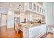 Bright kitchen with stainless steel appliances, an island with seating, and ample counter space at 843 Howard Ave., Myrtle Beach, SC 29577