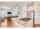 Beautiful kitchen offers hardwood floors, granite countertops, a gas cooktop, and stainless steel appliances at 843 Howard Ave., Myrtle Beach, SC 29577