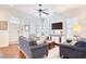 Inviting living room featuring hardwood floors, comfortable seating, and natural light at 843 Howard Ave., Myrtle Beach, SC 29577