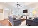 Inviting living room with hardwood floors, plush seating, and a stylish media console at 843 Howard Ave., Myrtle Beach, SC 29577