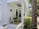 Inviting covered front porch featuring a bench and ceiling fan at 843 Howard Ave., Myrtle Beach, SC 29577