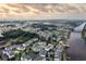 Aerial view of neighborhood featuring beautiful landscaping, a pond, and waterway access at 901 West Port Dr. # 1807, North Myrtle Beach, SC 29582