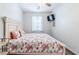 Comfortable bedroom with neutral paint, mounted TV, and coastal-themed comforter, providing a relaxing retreat at 901 West Port Dr. # 1807, North Myrtle Beach, SC 29582