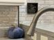 Decorated countertop with a decorative sign and accent pumpkin in front of the stainless steel faucet at 901 West Port Dr. # 1807, North Myrtle Beach, SC 29582