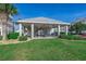 Open air pavilion for outdoor cooking and dining, with picnic tables and lush landscaping at 901 West Port Dr. # 1807, North Myrtle Beach, SC 29582