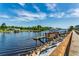 Beautiful waterfront view with pier, gazebo and boardwalk under a bright blue sky at 901 West Port Dr. # 1807, North Myrtle Beach, SC 29582