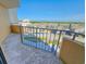 Open-air balcony with views of neighborhood and blue skies above at 9650 Shore Dr. # 706, Myrtle Beach, SC 29572