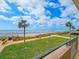 View of ocean and beach area from outdoor patio with palm trees at 9650 Shore Dr. # 706, Myrtle Beach, SC 29572