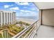 Scenic view from the balcony overlooking the ocean, pool, and beautifully landscaped grounds at 9840 Queensway Blvd. # 1207, Myrtle Beach, SC 29572