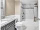 Bathroom featuring marble tile, a shower-tub combo, and a granite vanity at 9840 Queensway Blvd. # 1207, Myrtle Beach, SC 29572