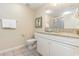 Well-maintained bathroom featuring a granite countertop, white vanity, toilet, and a shower with glass doors at 9994 Beach Club Dr. # 1601, Myrtle Beach, SC 29572