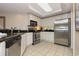 Kitchen with stainless steel appliances, white cabinets and granite countertops at 9994 Beach Club Dr. # 1601, Myrtle Beach, SC 29572