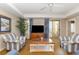 The living room area with ceiling fan and sliding doors to the outdoor porch at 9994 Beach Club Dr. # 1601, Myrtle Beach, SC 29572