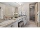 Elegant bathroom with marble countertops, dual sinks, and a glass-enclosed shower at 101 Ocean Creek Dr. # Dd-9, Myrtle Beach, SC 29572