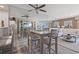 Dining area with seating for four and mirrored wall at 101 Ocean Creek Dr. # Dd-9, Myrtle Beach, SC 29572