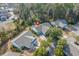 Aerial view of property with mature landscaping and other homes in neighborhood at 10-1 Rattan Circle # 1, Pawleys Island, SC 29585