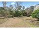 Large backyard showcasing plenty of space at 10-1 Rattan Circle # 1, Pawleys Island, SC 29585