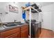 Efficient laundry room featuring a washer, dryer, and sink with storage at 10-1 Rattan Circle # 1, Pawleys Island, SC 29585