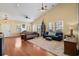 Spacious living room with two sofas, ceiling fans and hardwood floors throughout at 10-1 Rattan Circle # 1, Pawleys Island, SC 29585