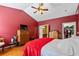 Spacious main bedroom featuring a ceiling fan, and ensuite bathroom at 10-1 Rattan Circle # 1, Pawleys Island, SC 29585