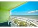 Balcony overlooking the beach with chairs and a great view of the ocean and beach at 1105 S Ocean Blvd. # 336, Myrtle Beach, SC 29577