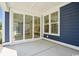 Back porch with a sliding door and exterior windows at 1800 Tryon Dr, Myrtle Beach, SC 29588