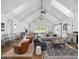 Clubhouse with a high vaulted ceiling, sofas, and tables at 1800 Tryon Dr, Myrtle Beach, SC 29588