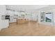 Spacious open-concept kitchen with an island and stainless steel appliances that opens to the dining area at 1800 Tryon Dr, Myrtle Beach, SC 29588