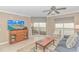 Relaxing living room with a TV, balcony access, and open space for entertaining guests at 1819 Ocean Blvd. N # 1403, North Myrtle Beach, SC 29582