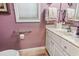 Powder room with white vanity, a marbled countertop, and accessibility support features at 1822 Topsail Ln., North Myrtle Beach, SC 29582