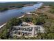 Wide angle aerial showcasing water, roadways and a boat storage area at 2120 Adams Way, Little River, SC 29566