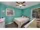 Comfortable bedroom with wood floors, soft lighting, and calming paint color at 2120 Adams Way, Little River, SC 29566