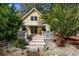 Inviting front porch featuring white lattice trim, quaint details, and a comfortable outdoor space at 2120 Adams Way, Little River, SC 29566