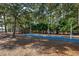 Community playground featuring slides, a play structure, and a designated basketball area for outdoor fun at 2120 Adams Way, Little River, SC 29566