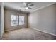 Bedroom with a ceiling fan and a window bringing in natural light at 223 Gloucester Way, Little River, SC 29566