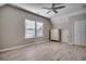 Bedroom with a ceiling fan, window, closet and light wood flooring at 223 Gloucester Way, Little River, SC 29566