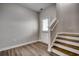 Entryway with beautiful vinyl flooring, stairway to the upper floor, and bright white trim at 223 Gloucester Way, Little River, SC 29566