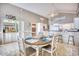 Charming dining area featuring an oval table, seating for four, and stylish coastal decor accents at 2402 N Ocean Blvd., North Myrtle Beach, SC 29582