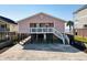 Lovely raised beach home with covered parking and peek of the ocean at 2402 N Ocean Blvd., North Myrtle Beach, SC 29582