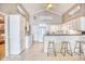 Bright kitchen with white cabinetry, tile backsplash, and modern appliances at 2402 N Ocean Blvd., North Myrtle Beach, SC 29582