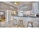 Kitchen with bar stool seating, complete with updated appliances and modern style at 2402 N Ocean Blvd., North Myrtle Beach, SC 29582