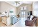 Relaxing living room featuring comfortable sofas, beach-themed decor, and ocean views at 2402 N Ocean Blvd., North Myrtle Beach, SC 29582