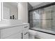 Modern bathroom featuring a sleek vanity, contemporary fixtures, and a tiled shower with glass doors at 2483 Morlynn Dr., Myrtle Beach, SC 29577