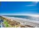 Stunning aerial view of the beach, showcasing its pristine sands and sparkling ocean waters at 2501 S Ocean Blvd. # 601, Myrtle Beach, SC 29577