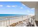 Relax on this expansive balcony with panoramic ocean views, an ideal retreat at 2701 S Ocean Blvd. # 1009, North Myrtle Beach, SC 29582