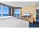 Serene bedroom featuring two beds and an expansive ocean view from the private balcony at 2701 S Ocean Blvd. # 1009, North Myrtle Beach, SC 29582