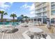 Outdoor picnic tables near the pool with bar nearby at 2701 S Ocean Blvd. # 1009, North Myrtle Beach, SC 29582